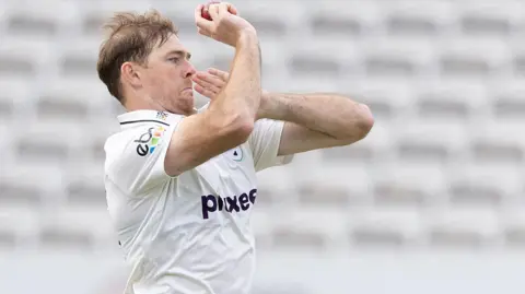 Tom Taylor bowling for Worcestershire at Lord's