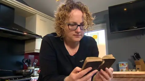 Amy Abethell with the diary