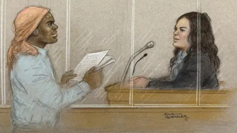 Julia Quenzler A court sketch showing Mark Gordon, who is wearing a shirt and peach-coloured headscarf while holding some papers, questioning Constance Marten, a woman with dark brown hair who is wearing a dark jumper and sitting in the witness box with microphones in front of her, from the glass dock.