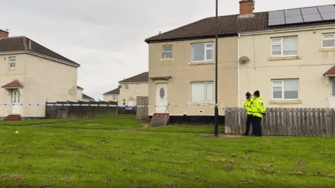 Police at the scene of the dog attack in Shiney Row