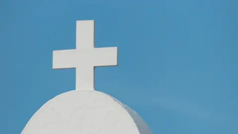 A stock image of a church spire.