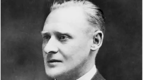 Getty Images An black and white image of Reginald Joseph (RJ) Mitchell, who came up with the design of the Supermarine Spitfire.