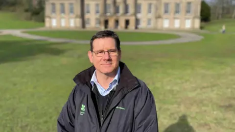 General Manager Stuart Alcock outside Calke Abbey where Peaky Blinders was filmed