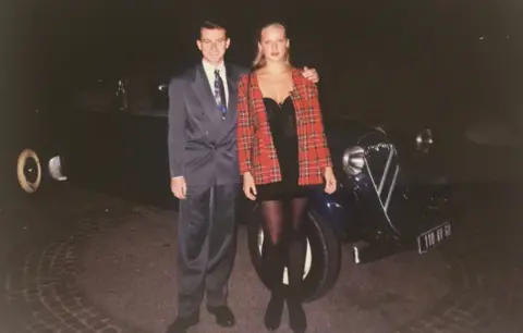 ITV Howard and Bridgette stood in front of a car on their date in Germany, 1993