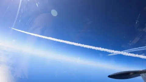 Virgin Orbit Chase plane watches rocket fly