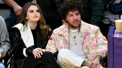 Benny Blanco and Selena Gomez at a LA Lakers game