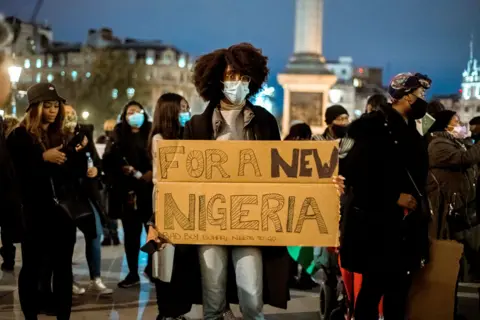 Joseph Okpako Protesters in Trafalgar Square in London