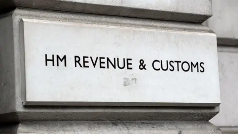 HM Revenue and Customs (HMRC) sign on a white stone building
