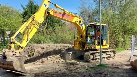 Southern Water A digger excavates soil during works at Ashurst Bridge.