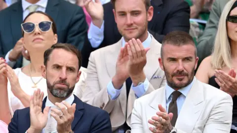 Sir Gareth Southgate, Sir David Beckham and Stuart Broad watch tennis at Wimbledon