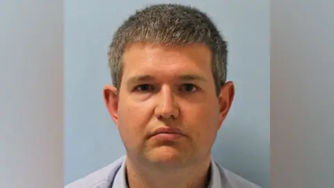 NCA Custody mugshot of Adam Taylor