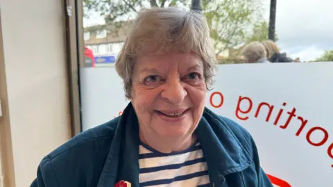 Banstead resident Chris Clay looks straight at the camera.