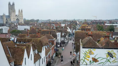 The old centre of Canterbury, as seen from above on a grey day. The cathedral can be seen to the left of the image.