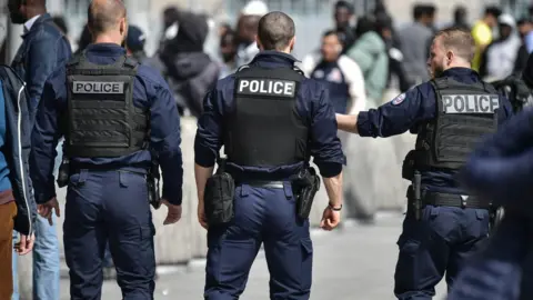 Getty Images Three French policemen