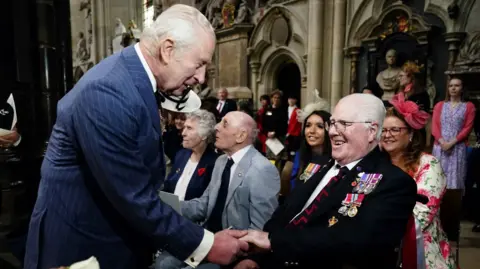King Charles speaks with Second World War veterans