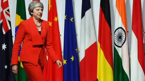 PA Media Theresa May at the G20 summit in Osaka