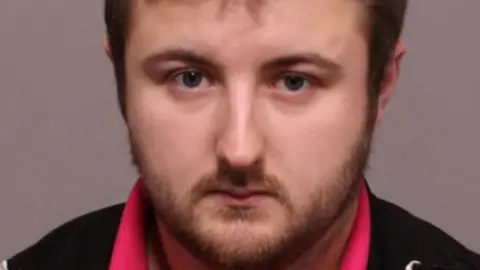 Leicestershire Police A police mugshot of Michael Davis