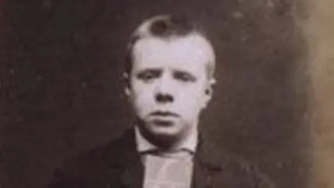 National Records of Scotland A mugshot of a young man, John Porter. He has short, cropped hair and is looking forlornly into the camera. The image is in black and white. 