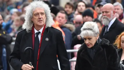 PA/Joe Giddens Brian May and Anita Dobson