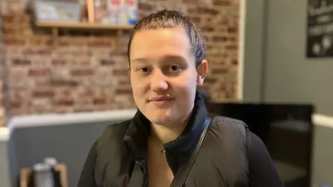 BBC Tenant in her living room