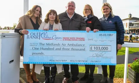 Midlands Air Ambulance Charity L-R: Stephanie, Diane and Roger Cole (Charlotte’s sister and parents), Emma Wood, head of fundraising and marketing for Midlands Air Ambulance Charity, and Claire Dyson of Claire Dyson Racing