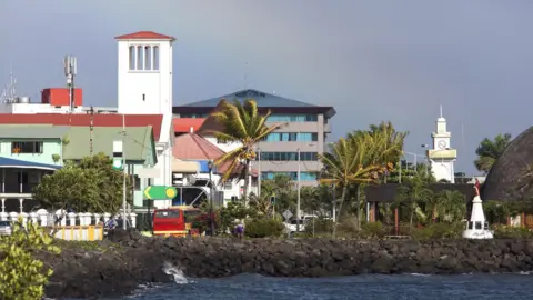 Getty Images A rainbow over Samoa's capital, Apia