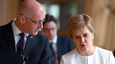 Getty Images John Swinney and Nicola Sturgeon