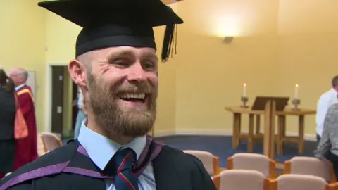 BBC Mark Ormrod at his graduation ceremony.