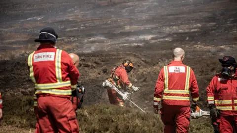 Firefighters in the moor
