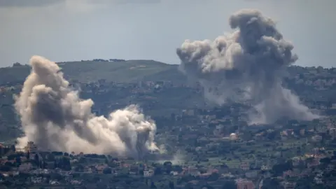 Smoke rises following explosions in southern Lebanon, near the Israel-Lebanon border, as seen from northern Israel (28 April 2026)