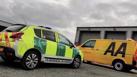 AA AA attending NHS vehicle