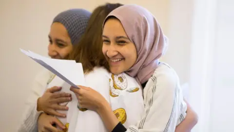 Matthew Horwood Students celebrating their A-level results at Ffynone House School in Swansea