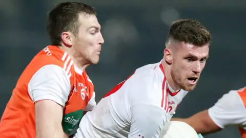 Armagh's Brendan Donaghy battles with Tyrone's Declan McClure