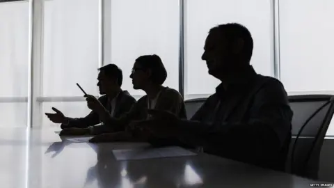 Getty Images Bosses in a meeting