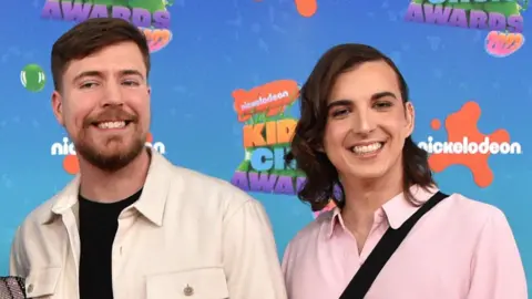 YouTube star MrBeast and co-host Ava Kris Tyson seen at an awards ceremony