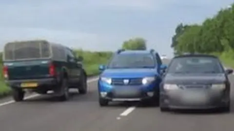 Car overtaking into traffic