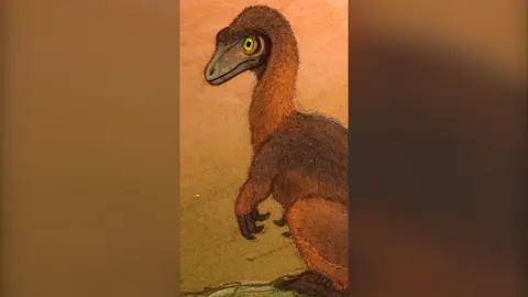 A cartoon image of an orange furry dinosaur. 