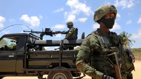 Reuters  Soldiers from the Rwandan security forces near the Afungi natural gas site in Mozambique in 2021