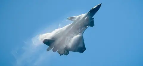 Getty Images A Chinese J-20 stealth fighter performs at the Airshow China 2018 in Zhuhai