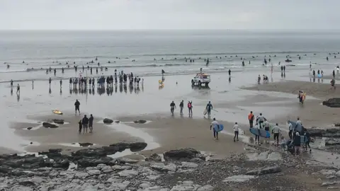 BBC Rest Bay beachfront busy with surfers