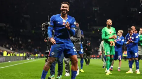 Homegrown captain Reece James celebrates a win away at Spurs in November