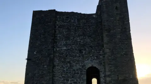 LDRS Clitheroe Castle - a square medieval style keep - at sunrise.