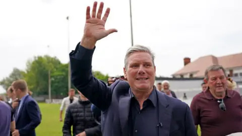 Getty Images Sir Keir Starmer waves on the day of the July by-election results