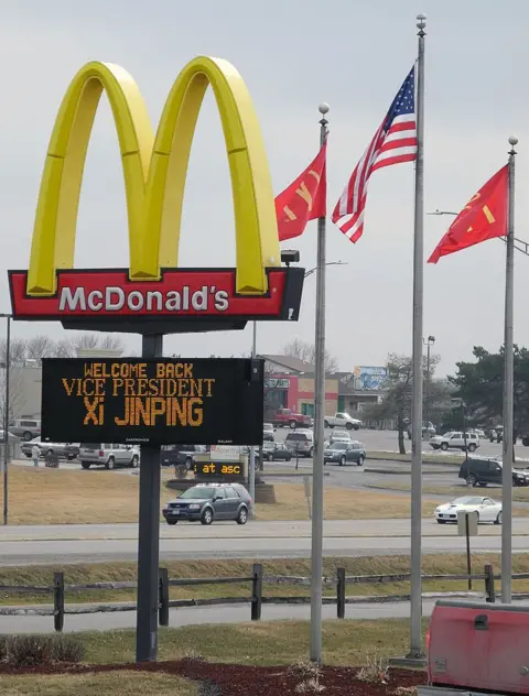 Getty Images A McDonald's restaurant in Muscatine welcomes Mr Xi during his trip in 2012