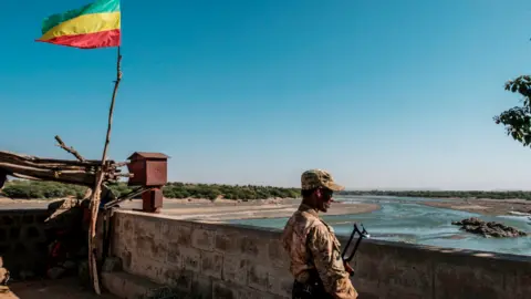 AFP A member of the Amhara Special Forces in Humera watches on at the border crossing with Eritrea - 22 November 2020