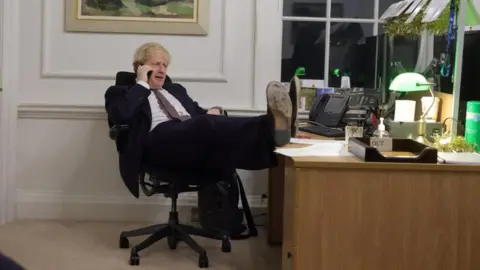 Andrew Parsons / No10 Downing St Post Brexit trade deal negotiations: Boris Johnson, inside his office at Number Ten Downing Street, speaking during the later of two telephone calls with the European Commission president on 23 Dec 2020