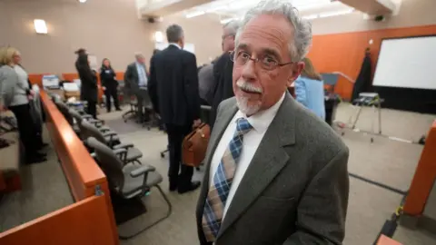 Getty Images Terry Sanderson leaves the courtroom on Friday