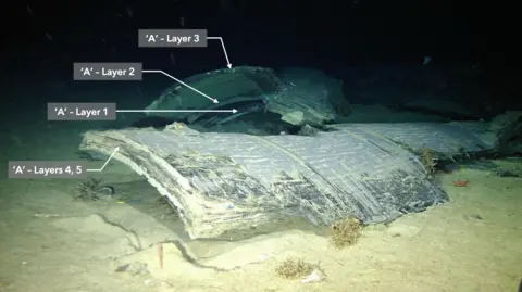 US Coastguard Wreck of submersible on seabed showing carbon fibre layers exposed