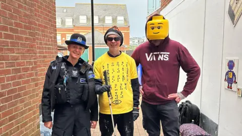 Gosport Police Police woman pictured with Clarke Reynolds and Bricksy