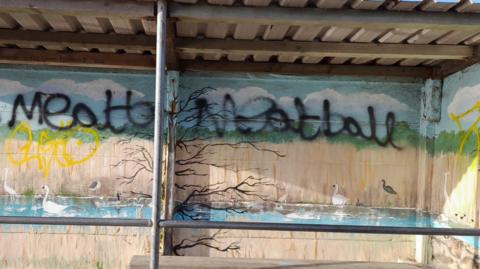 Graffitied bus stop